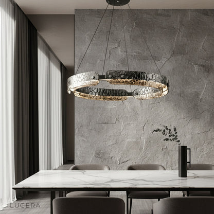 modern iron ring chandelier illuminating dining room with glass shades