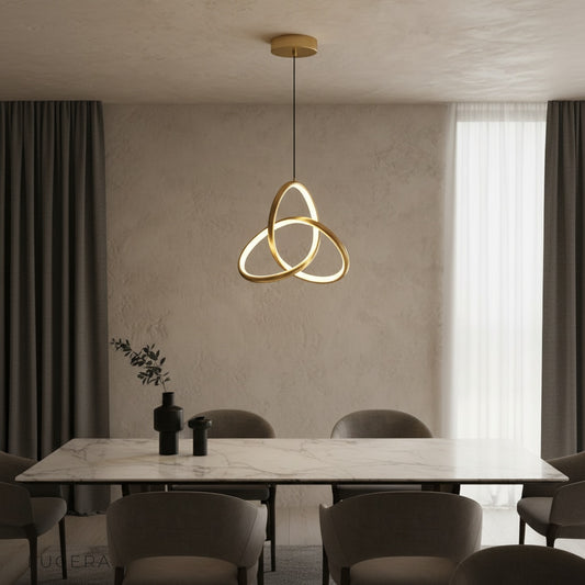 Tignanello pendant light illuminating modern living room with warm ambient glow