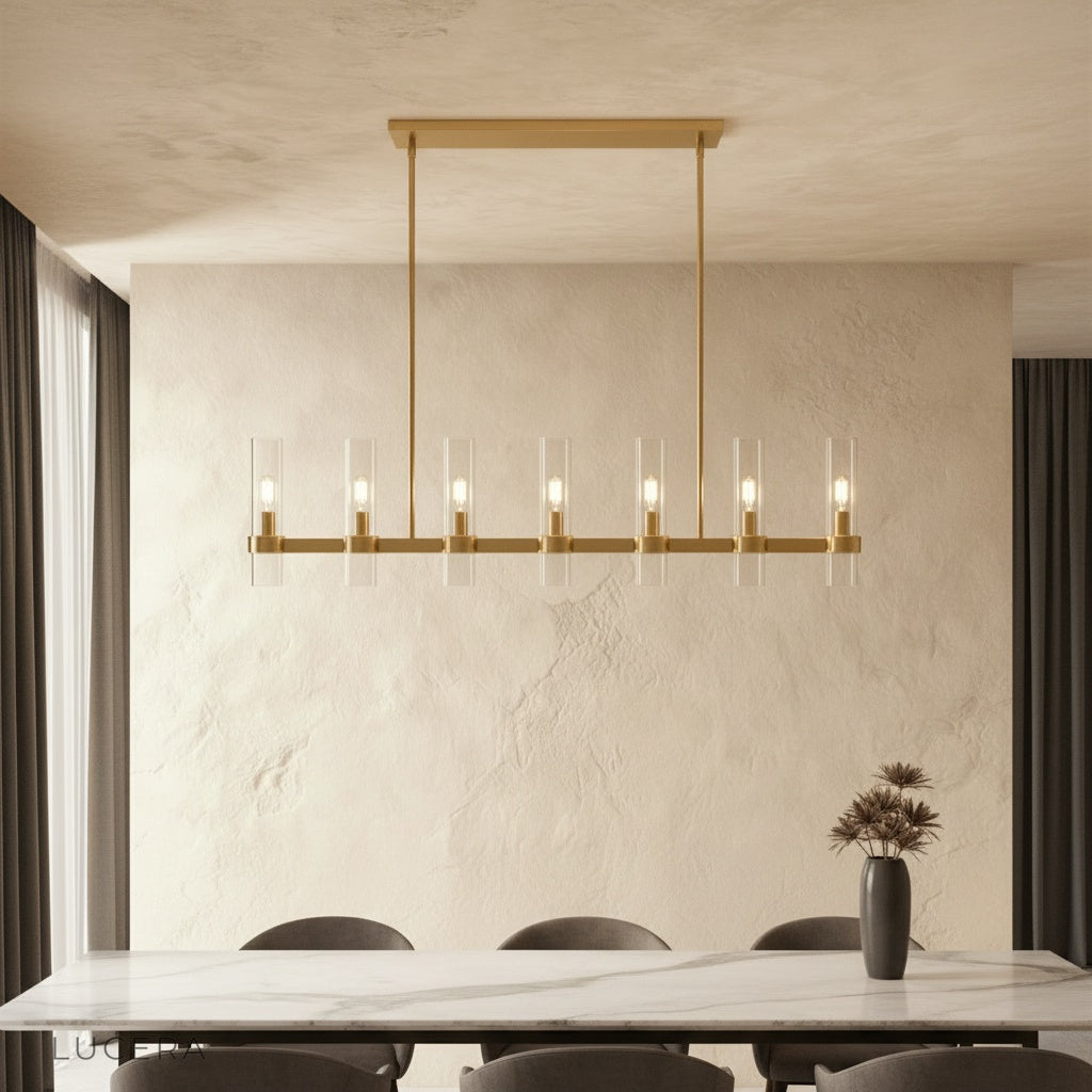 Katarina Candela chandelier glowing warmly in a cozy living room with soft evening light