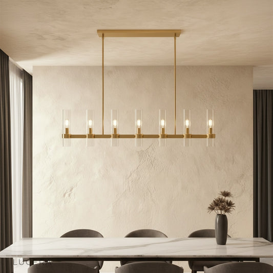 Katarina Candela chandelier glowing warmly in a cozy living room with soft evening light