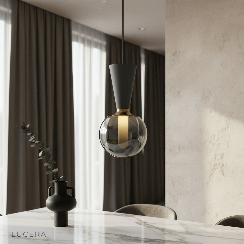 Ivan pendant light glowing over modern dining table in industrial-chic living room