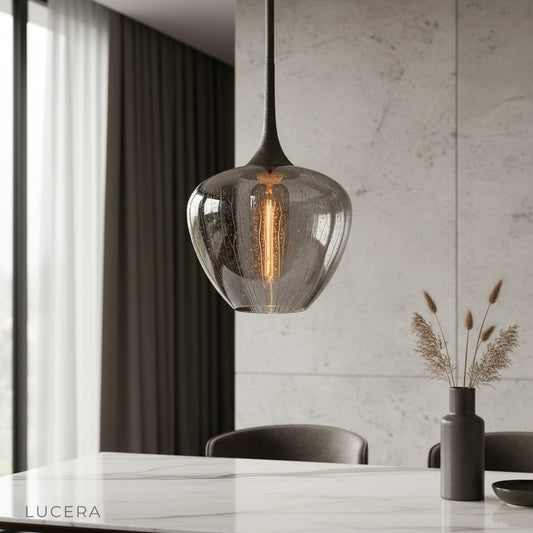 Livid Pendant Light over kitchen island with seeded glass shade glowing warmly