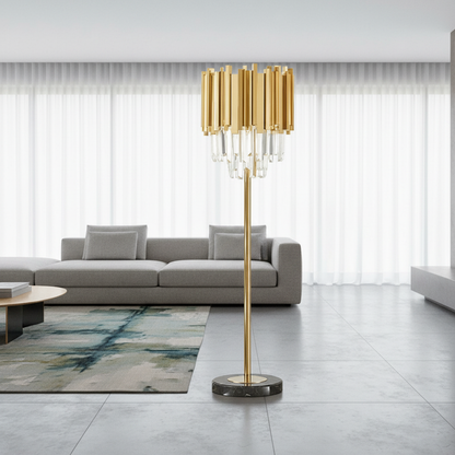 cobalt crystal gold floor lamp illuminating modern living room with navy sofa