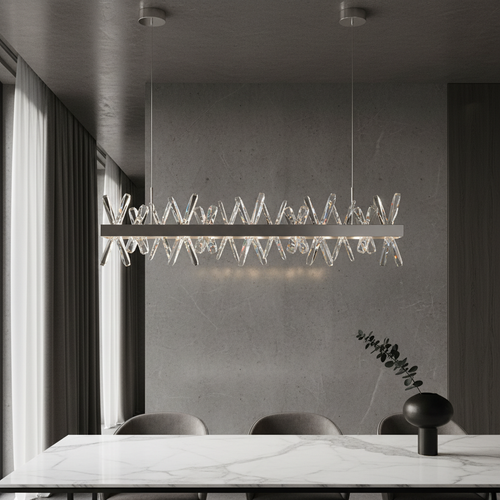 Arte gold rectangle crystal chandelier glowing in modern living room