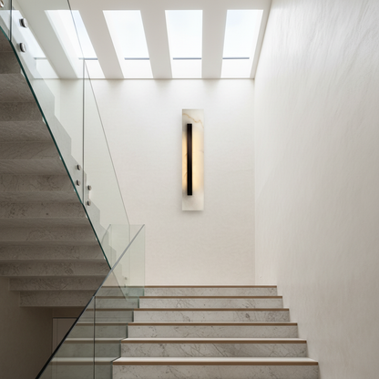 Minimalist studio view of Lucera marble wall sconce with clean lines and soft LED light
