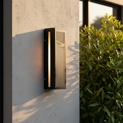 modern stainless steel wall lamp with marble panel illuminating a cozy outdoor patio