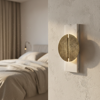 modern copper marble wall lamp glowing in bedroom with warm LED light