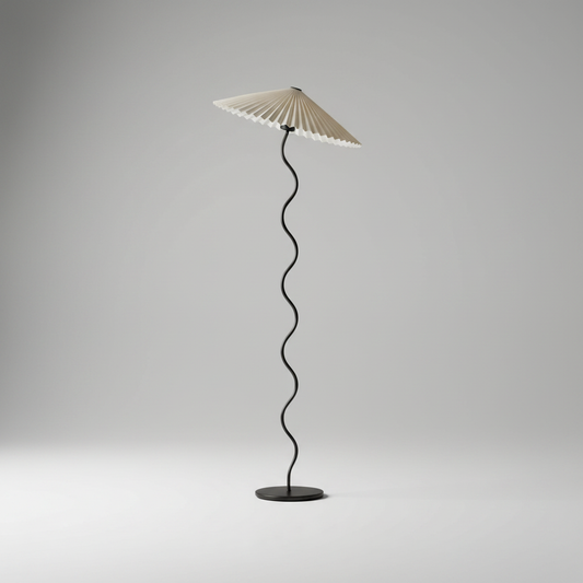 Studio shot of Imogen floor lamp with wavy stand and linen shade on neutral background