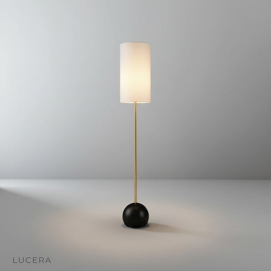Studio shot of Adorn Floor Lamp front view with slim wooden pole and spherical black base