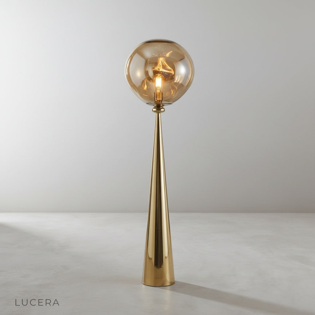 studio shot of Bastion floor lamp with conical stainless steel body