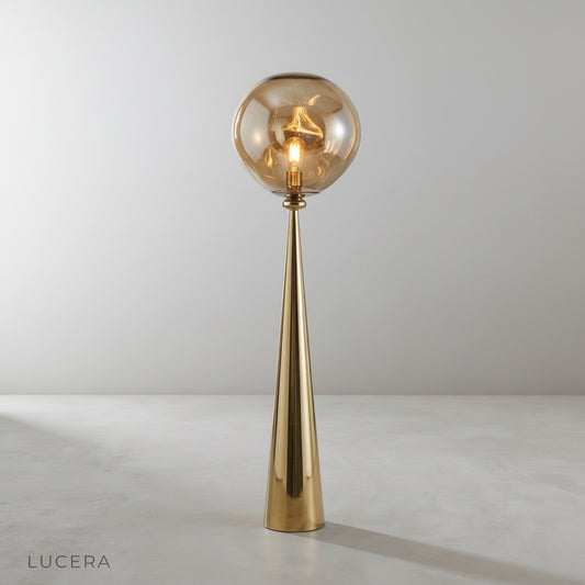 studio shot of Bastion floor lamp with conical stainless steel body