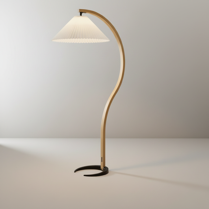 Studio shot of Yorick Floor Lamp front view with cast iron horseshoe base