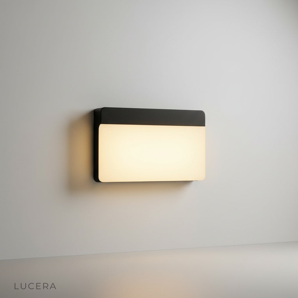 studio shot of rectangular LED outdoor wall sconce with white diffuser