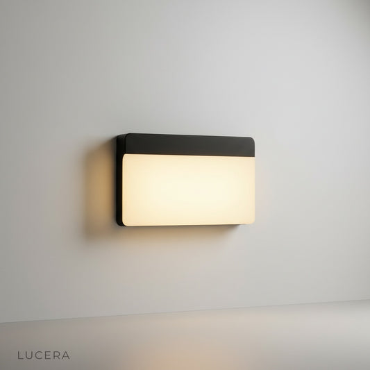 studio shot of rectangular LED outdoor wall sconce with white diffuser