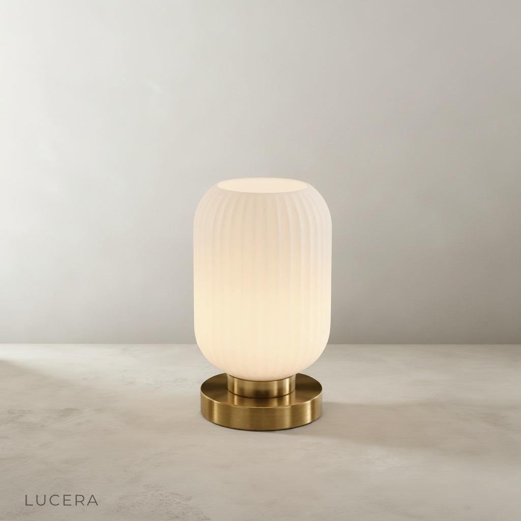 studio shot of divine table lamp front view on neutral beige background