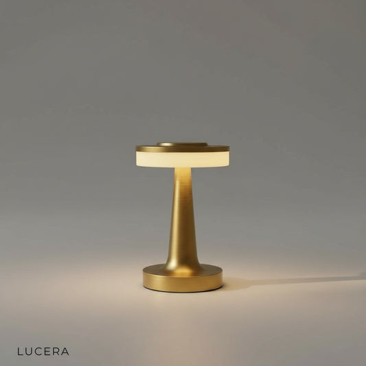 minimalist aluminum table lamp with circular shade on clean white studio background