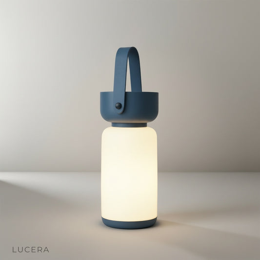 Minimalist acrylic cylindrical table lamp on clean white studio background front view