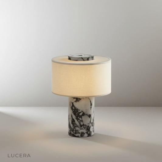 studio shot of colva table lamp front view on neutral beige background