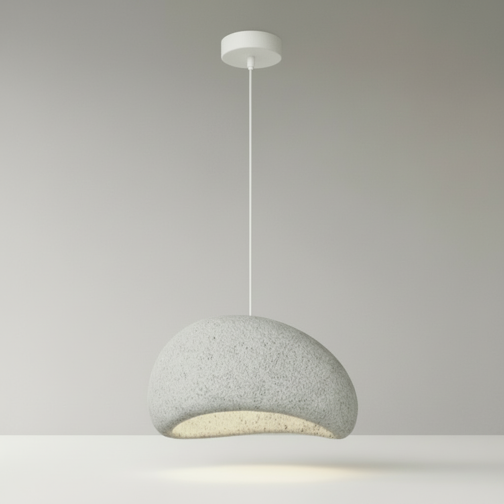 studio shot of suite sand pendant light on neutral beige background