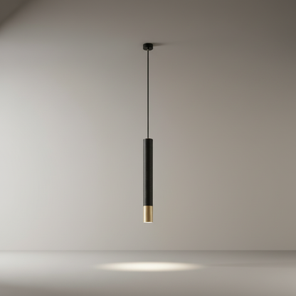 studio shot of a cylindrical aluminum Fascinate pendant light with contrasting gold band