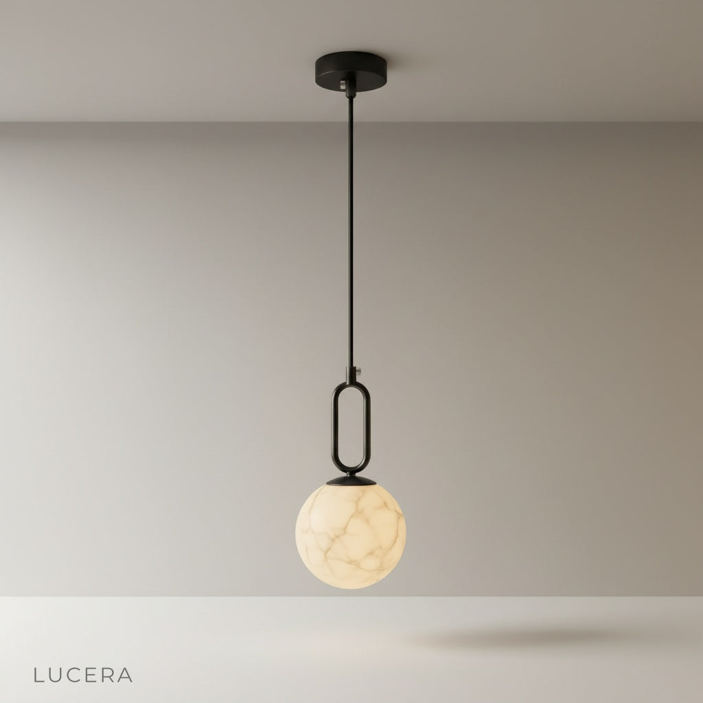 studio shot of teardrop alabaster pendant light on clean background