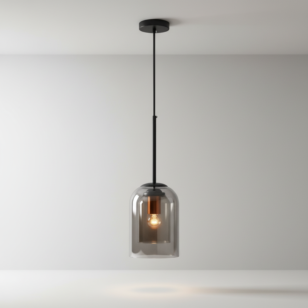 studio shot of Theodora pendant light with clear glass globes and brushed brass hardware
