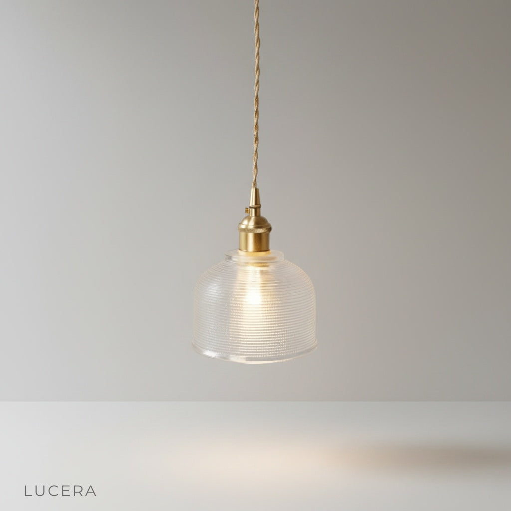 studio shot of Harmony Pendant Light brass and glass shade centered on clean white background