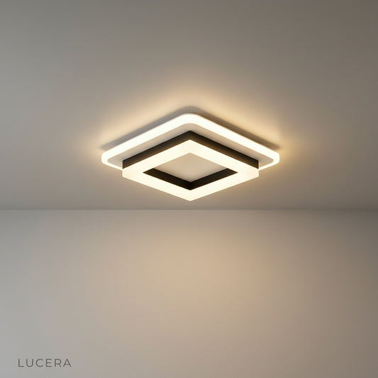 studio shot of Isadora ceiling light with frosted acrylic shade and aluminum frame