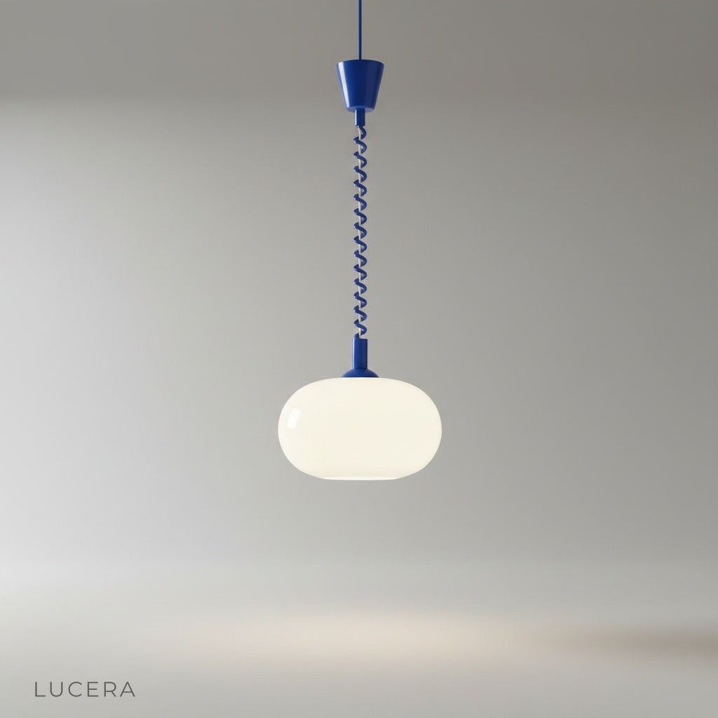 Xanthous pendant light studio shot front view with retractable PVC cable