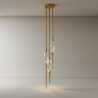 studio shot of Indus pendant light with clear asymmetrical crystal on black background