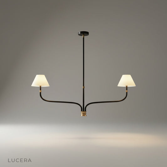 Studio shot of Dusk Chandelier with curved iron arms and gold accents on a clean white background