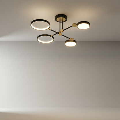 Studio shot of yin-yang ceiling light with circular forms and linear arms in black and gold