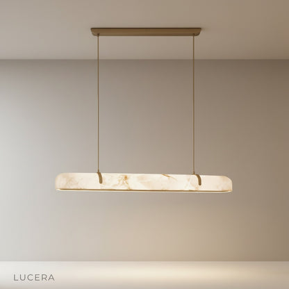 studio shot of Nerissa linear chandelier with sleek copper frame and white alabaster glass
