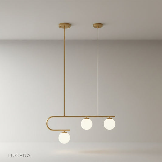 studio shot of sleek nephrite linear chandelier with minimalist black frame and clear glass shades