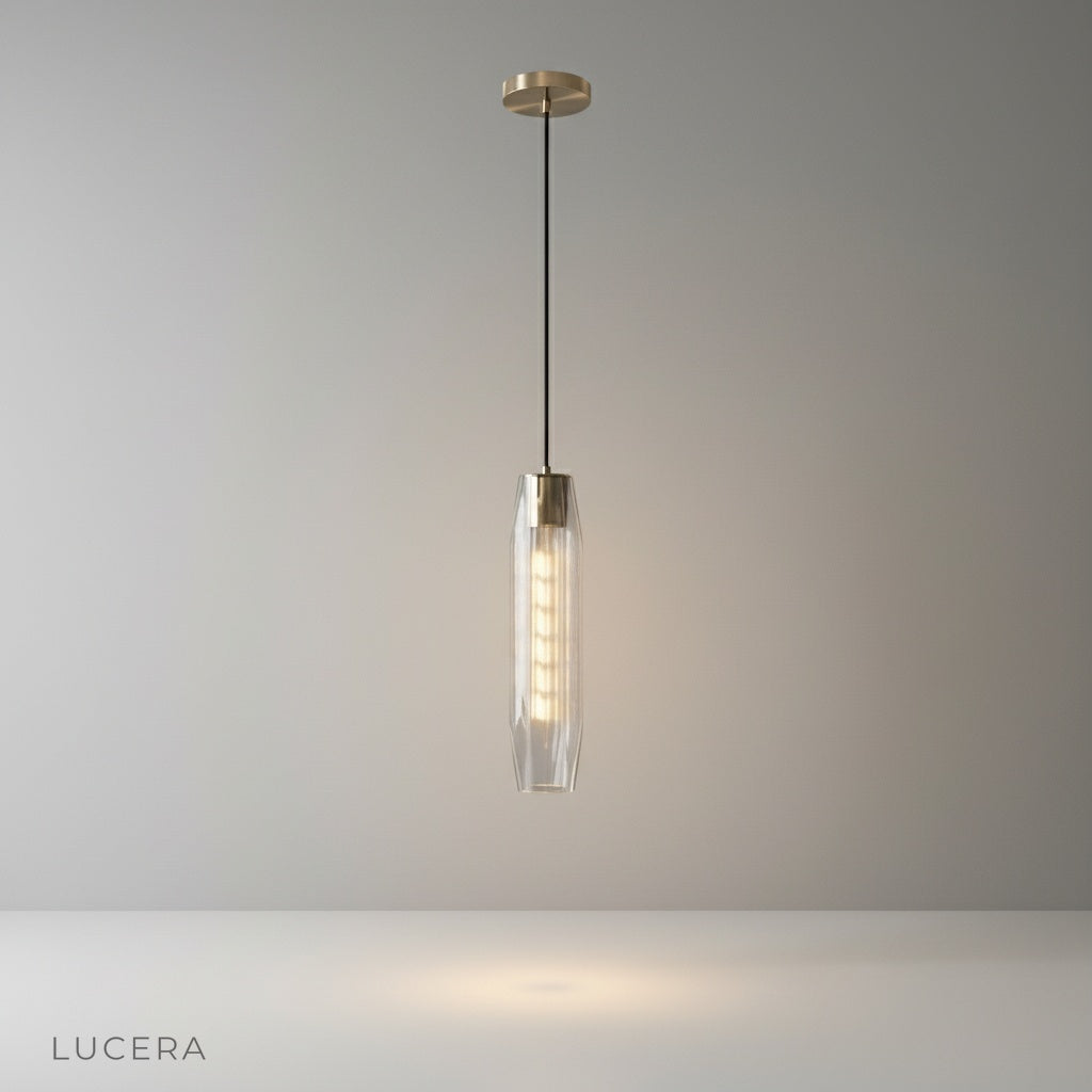 Hester Pendant Light studio shot front view with faceted crystal shade and brass frame