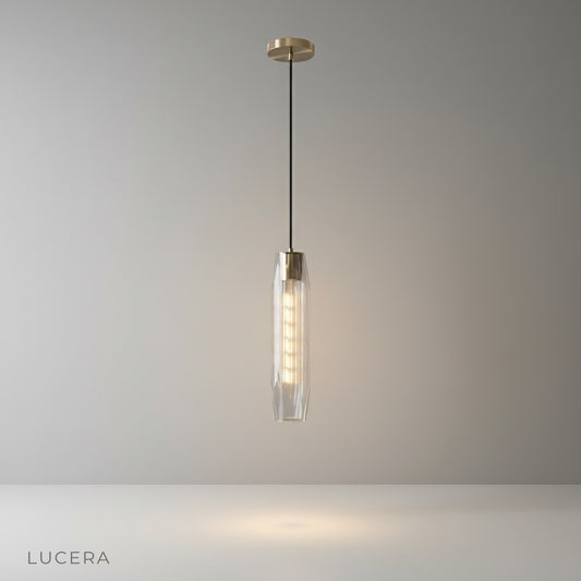 Hester Pendant Light studio shot front view with faceted crystal shade and brass frame