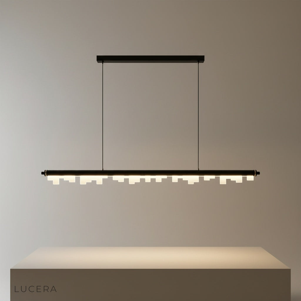 Studio shot of the Fascinating Pendant Light with sleek aluminum frame and geometric acrylic diffusers