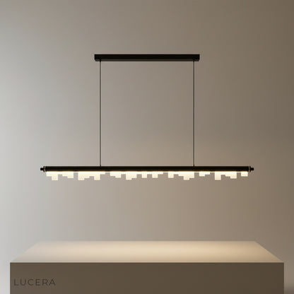 Studio shot of the Fascinating Pendant Light with sleek aluminum frame and geometric acrylic diffusers