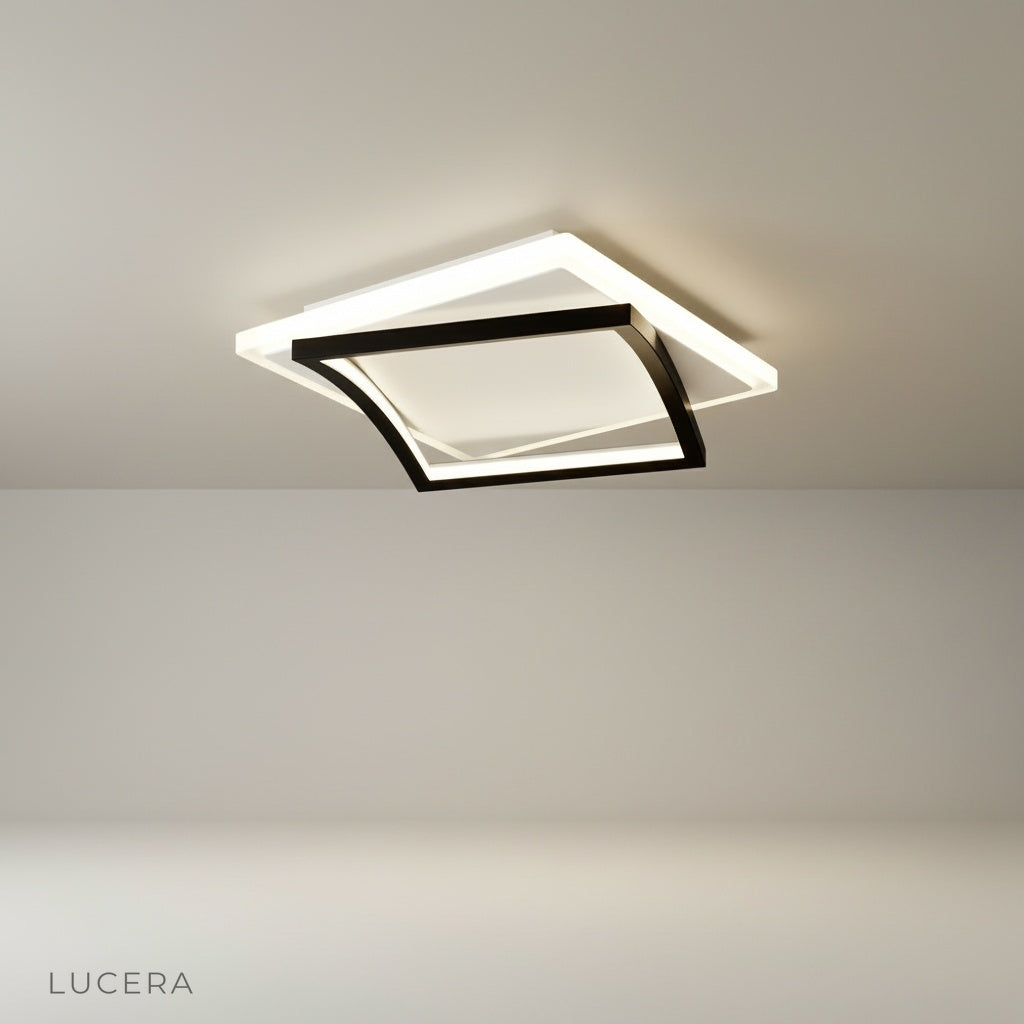 studio shot of broom ceiling light with sleek metal and acrylic finish on white background