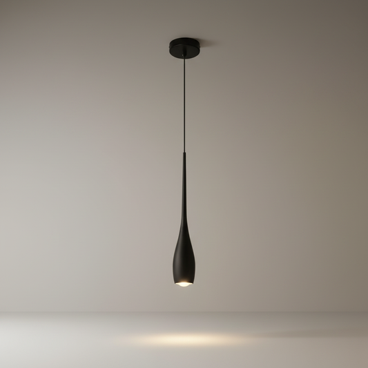 Studio shot of Kensington pendant light with elongated aluminum body and downward-facing glow
