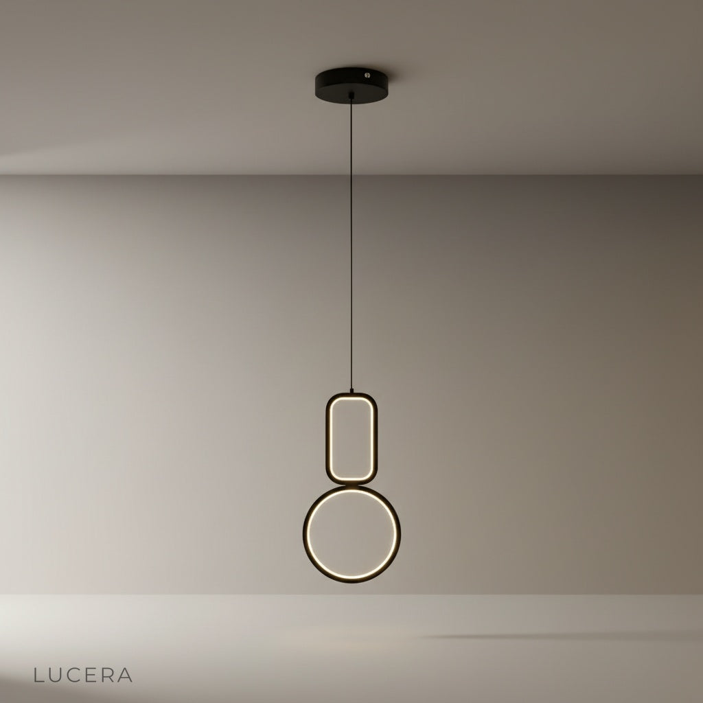 Studio shot of Facade pendant light with geometric metal frame and acrylic diffusers