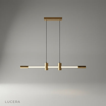 Gideon pendant light with brass accents and glass neon tube on a clean studio background