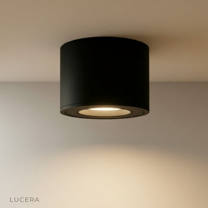 modern heat downlight illuminating cozy living room with warm ambient glow