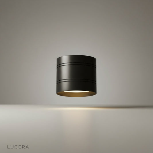 Studio shot of Eave downlight in black finish on clean white background
