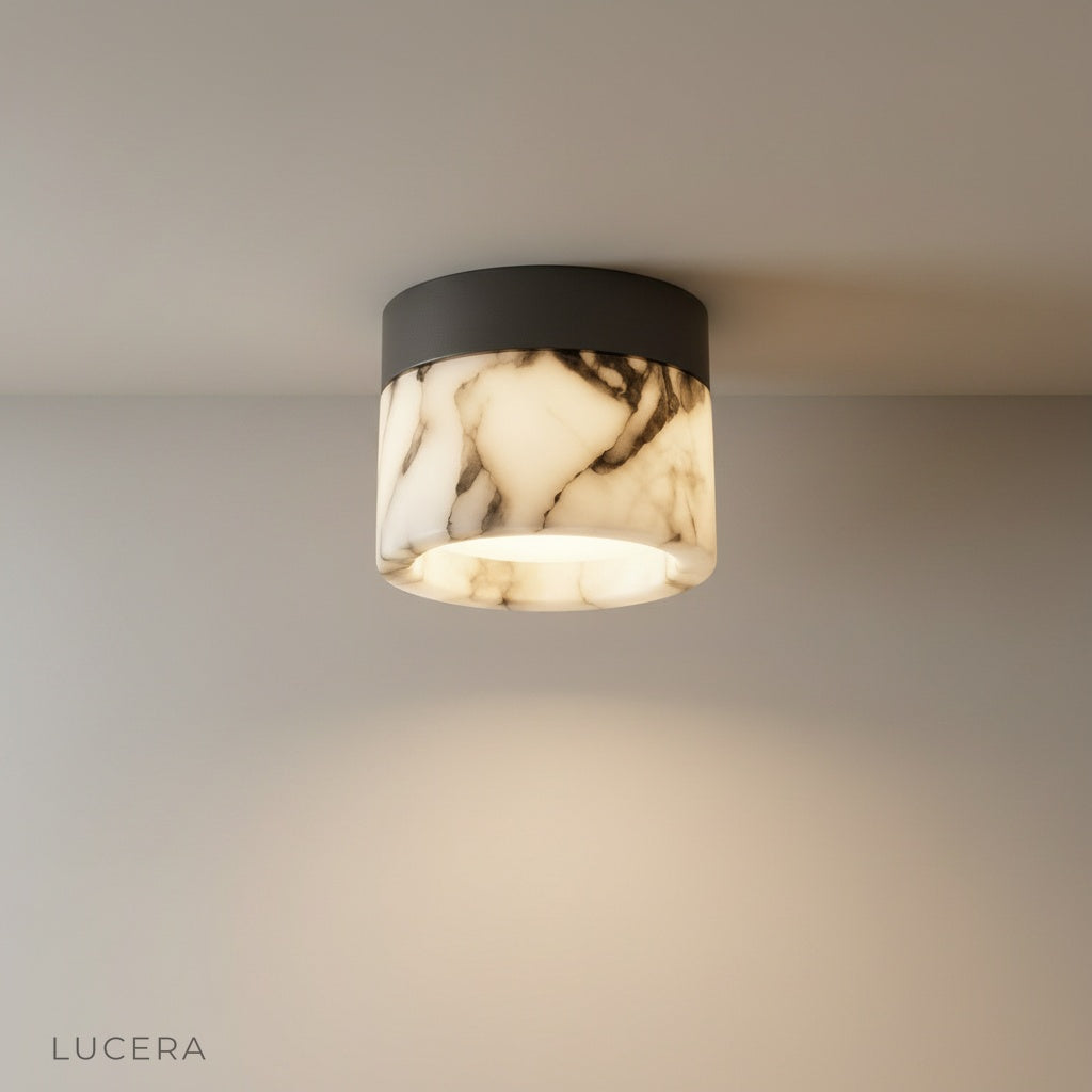 Lucera Raphael marble downlight studio shot on clean white background showing cylindrical form