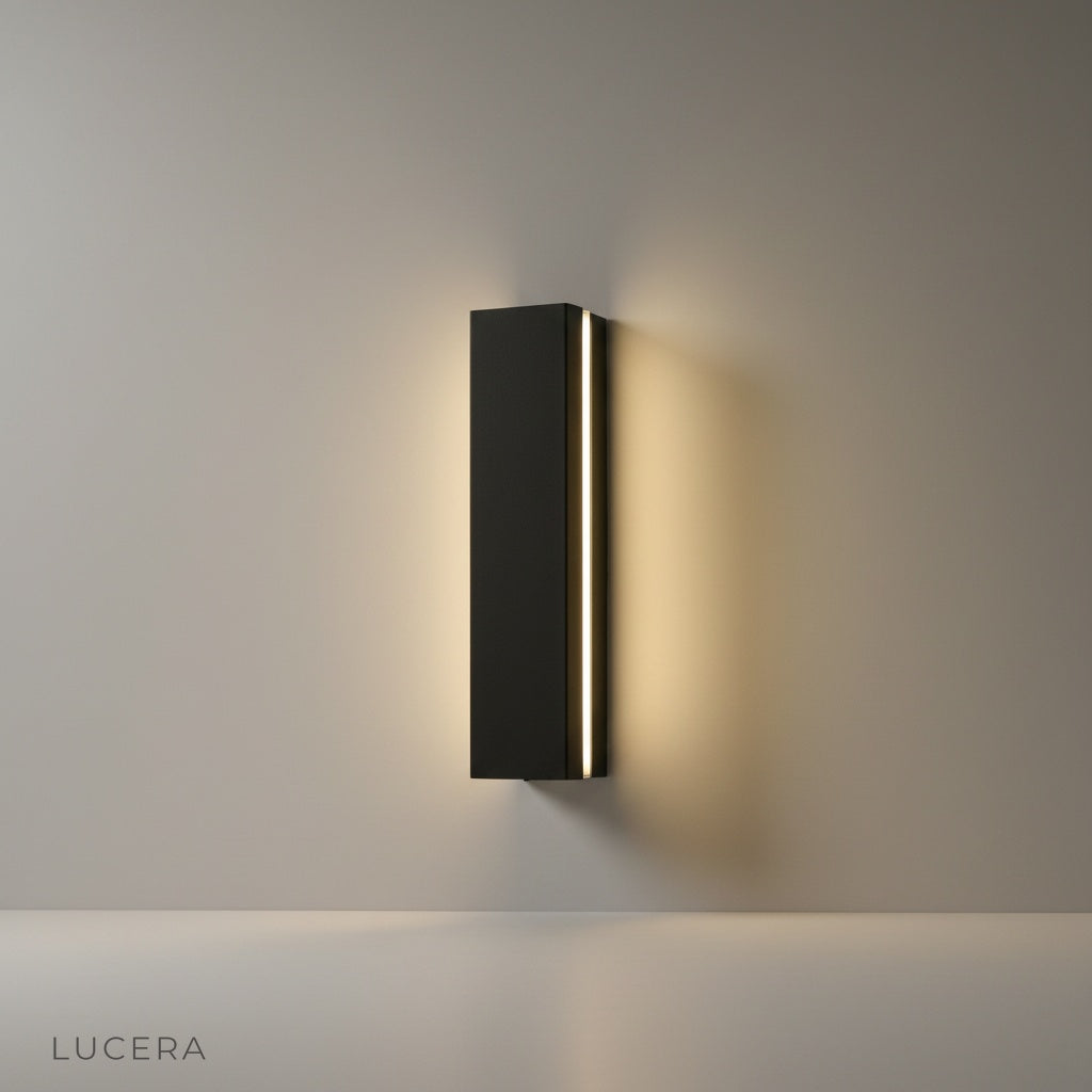 Minimalist white powder-coated aluminum wall lamp on a clean studio background