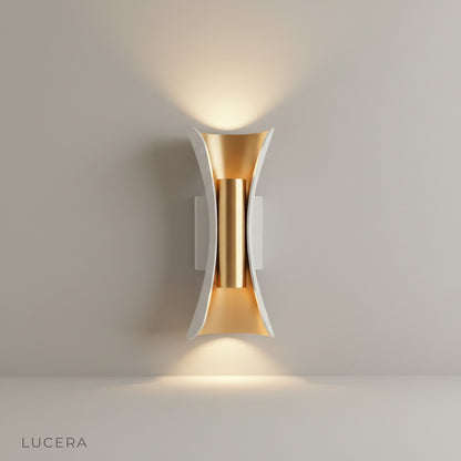 modern outdoor wall lamp illuminating a cozy patio seating area at dusk