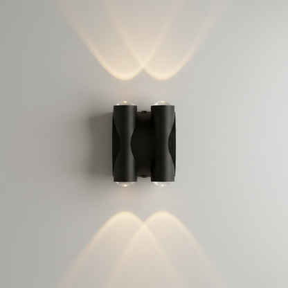 studio shot of sleek cylindrical xylophone wall light against white background