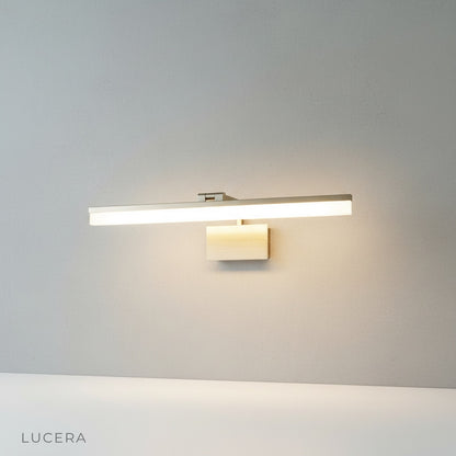 studio shot of balance wall lamp with linear arm and acrylic shade