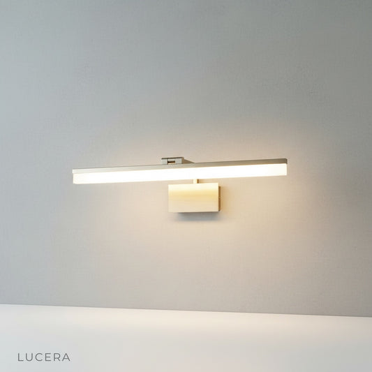 studio shot of balance wall lamp with linear arm and acrylic shade
